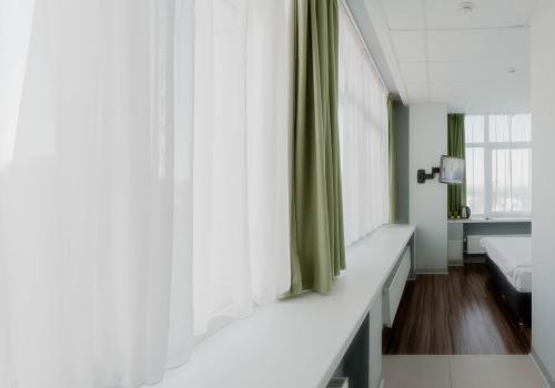 Номер улучшенный стандарт с 1 двуспальной кроватью