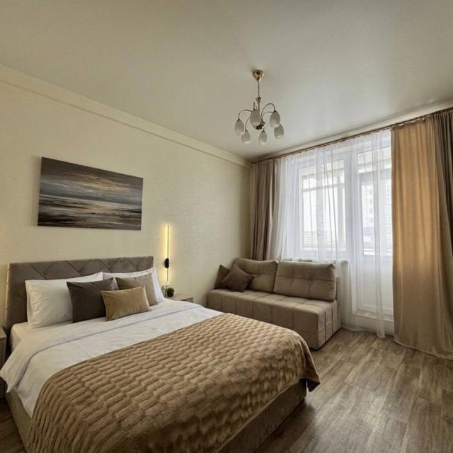View apartment with a balcony in the city center