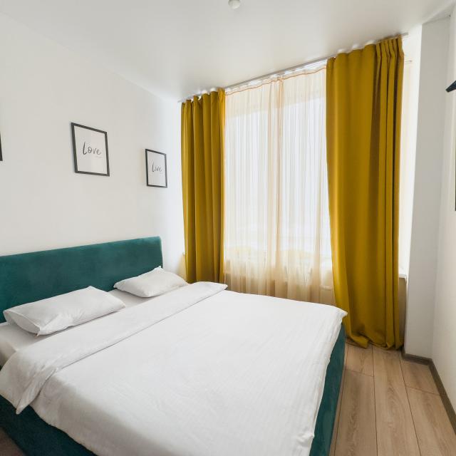 Radius central house apartments / Malysheva 42a