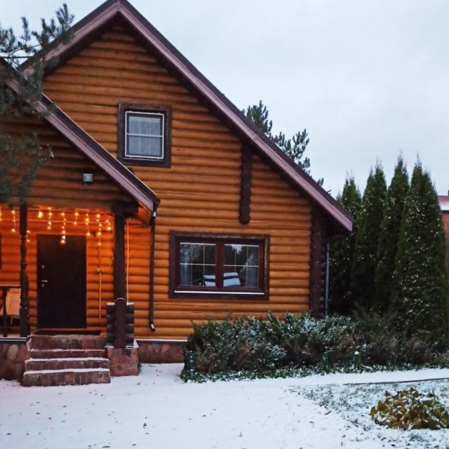 Log house with a Russian wood-burning sauna