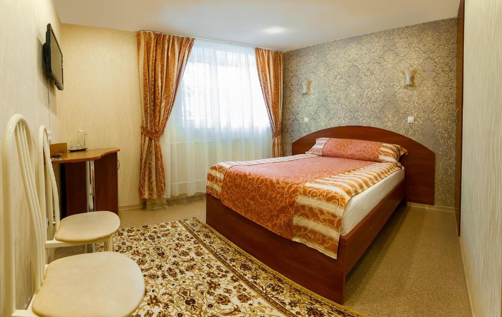 Номер стандарт с 1 двуспальной кроватью 3