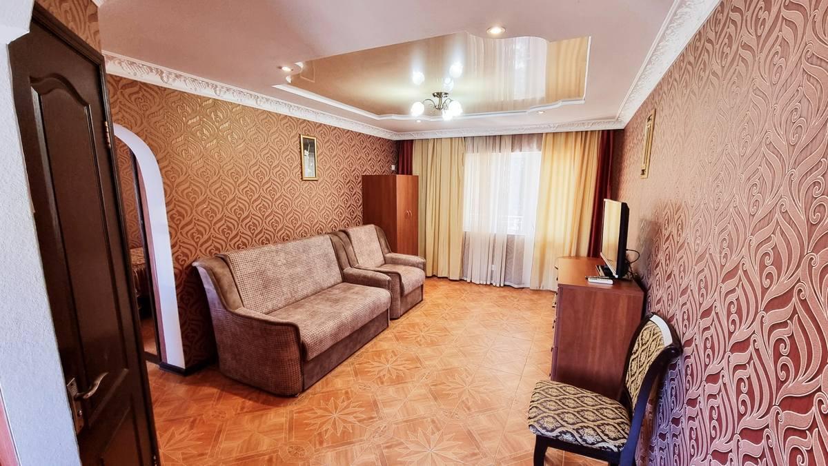 Номер делюкс семейный с 1 двуспальной кроватью
