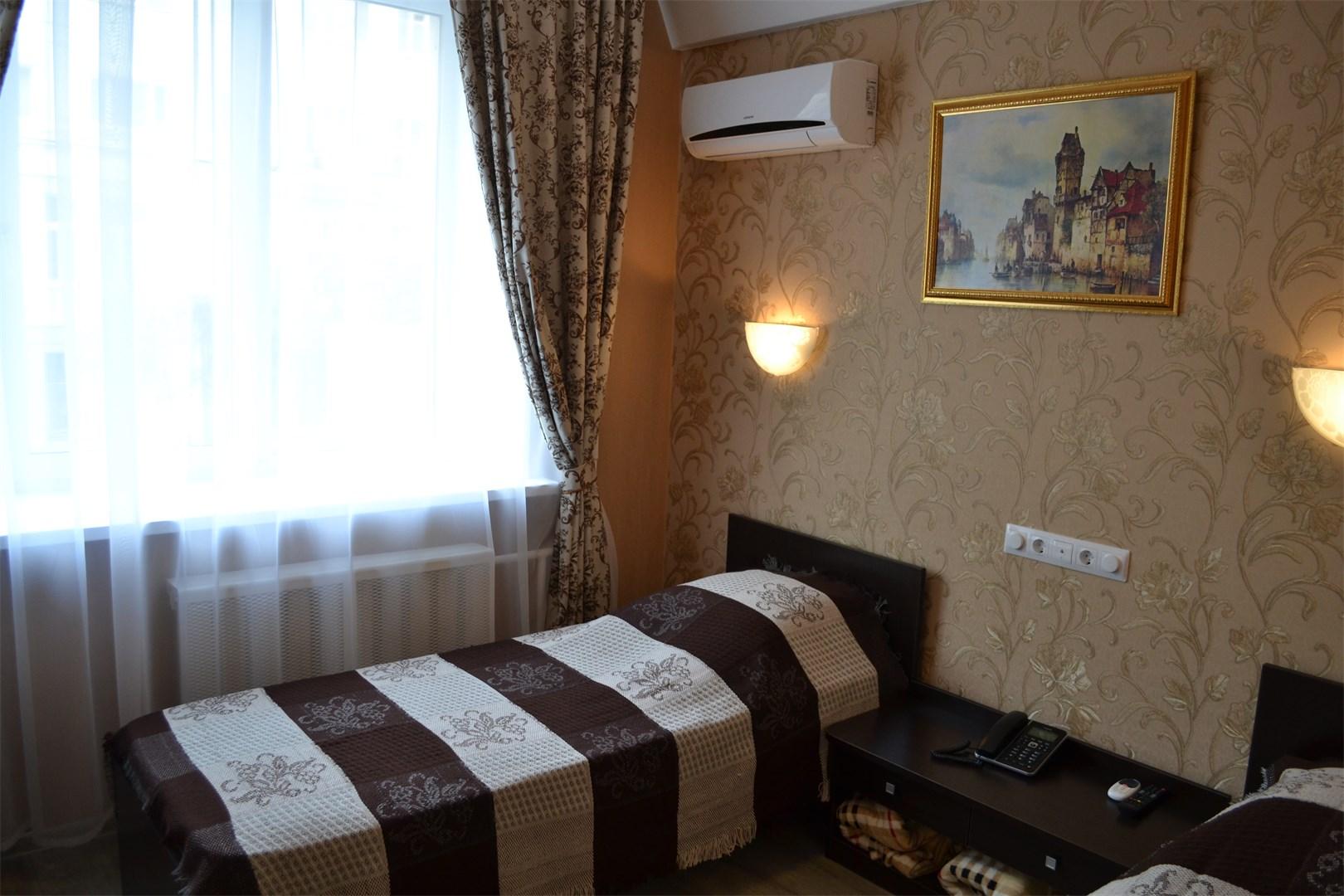 Номер эконом с 2 односпальными кроватями 3