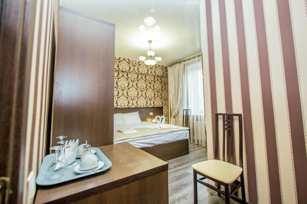 Номер люкс с 1 односпальной и 1 двуспальной кроватью 3