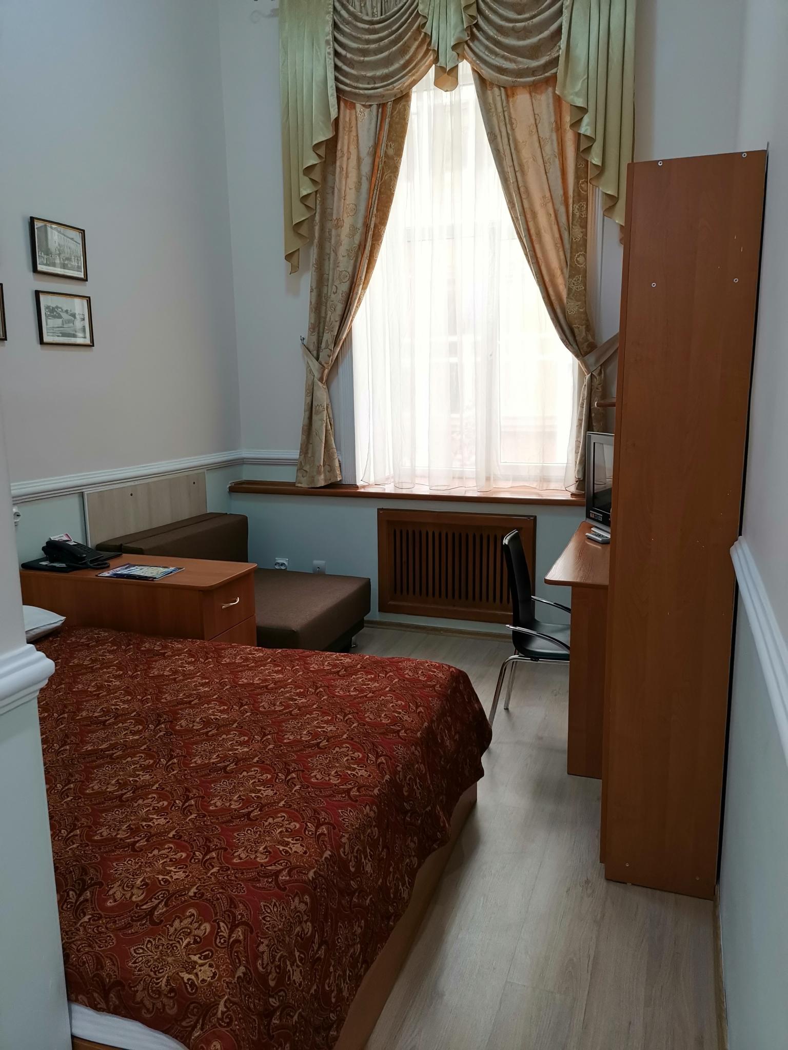 Номер стандарт с 1 двуспальной кроватью 4