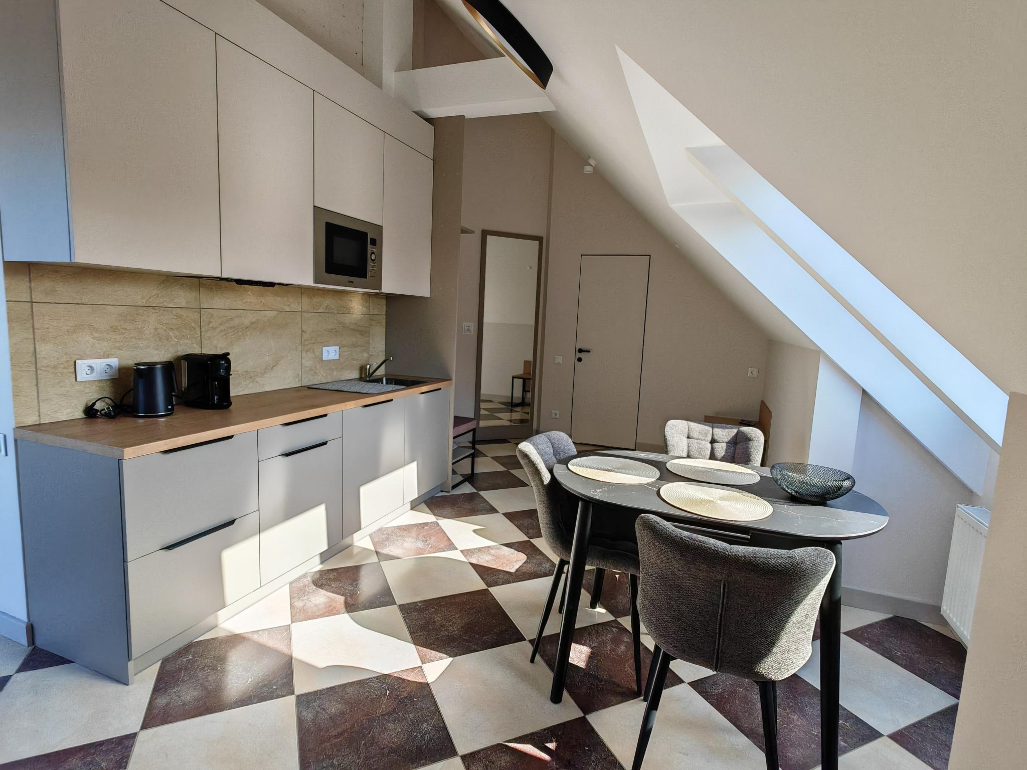 Номер студия премиум, 40 м² (мансарда) 4