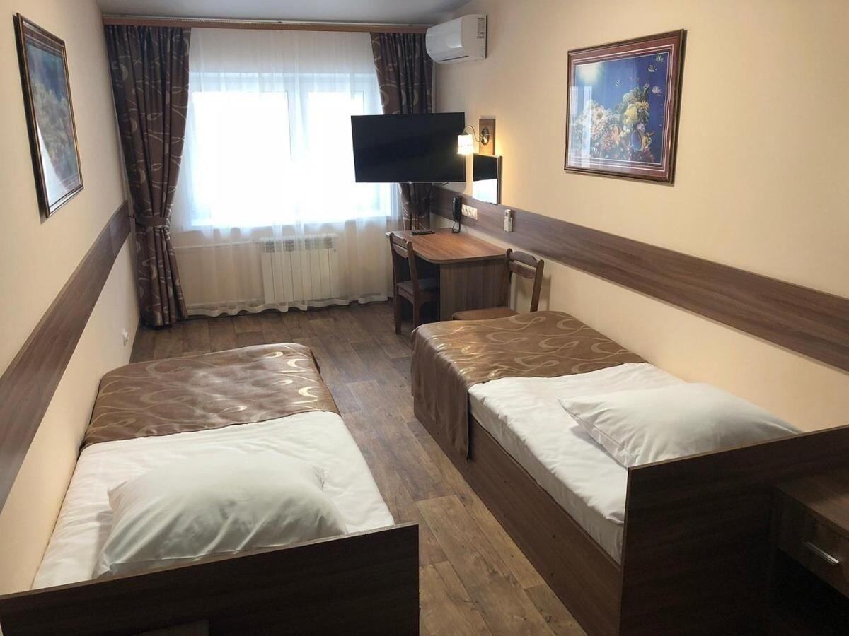 Номер комфорт с 2 односпальными кроватями 3
