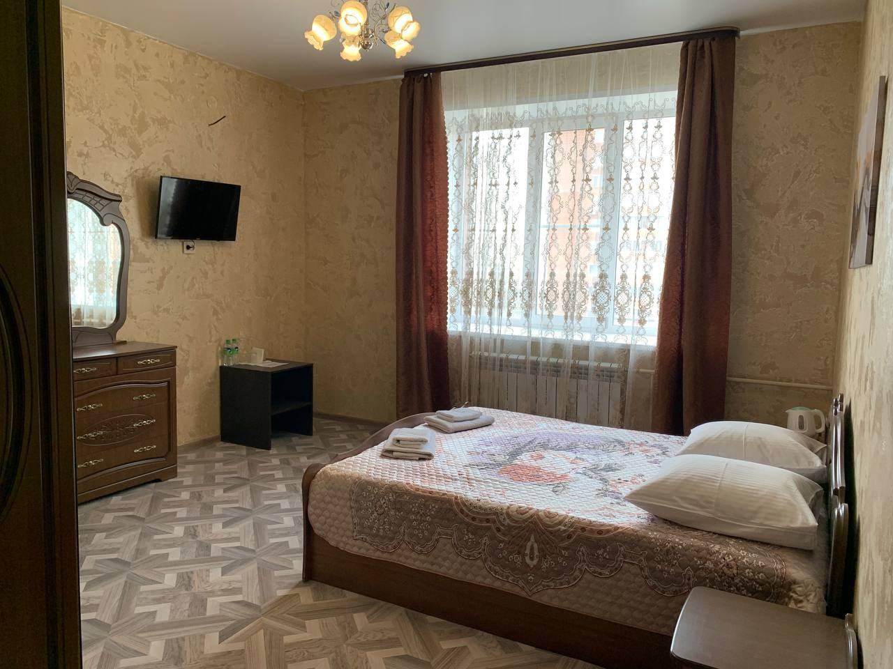 Номер стандарт с 1 двуспальной кроватью 3