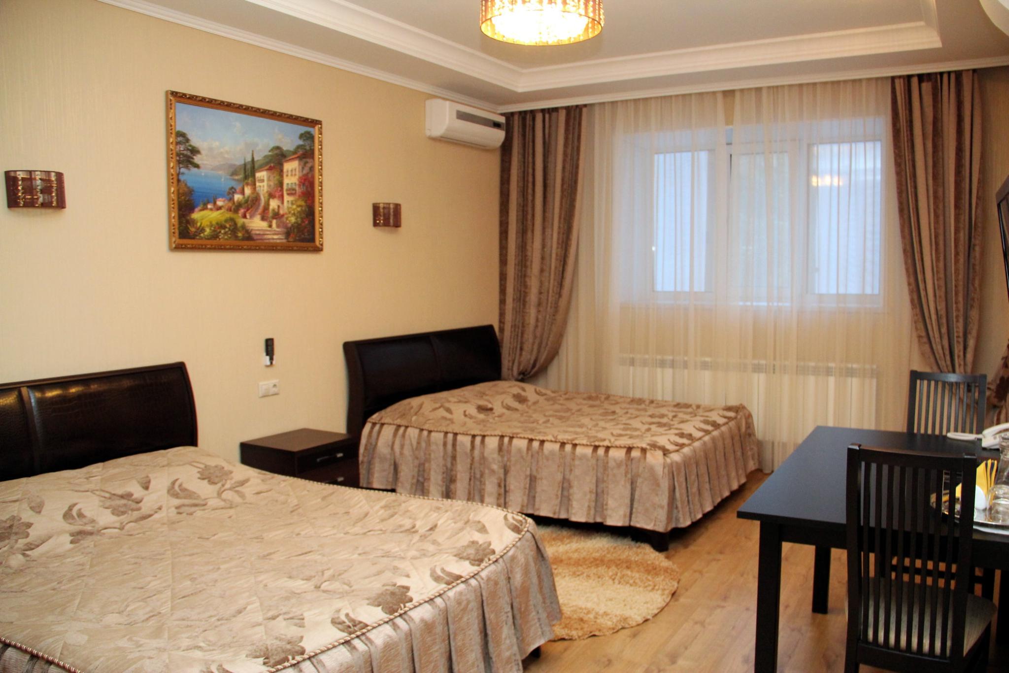 Номер комфорт улучшенный с 2 односпальными кроватями