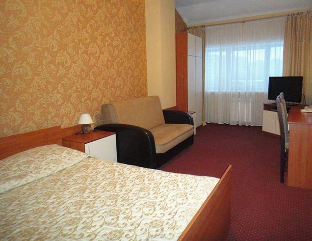 Номер стандарт с 1 двуспальной кроватью 4