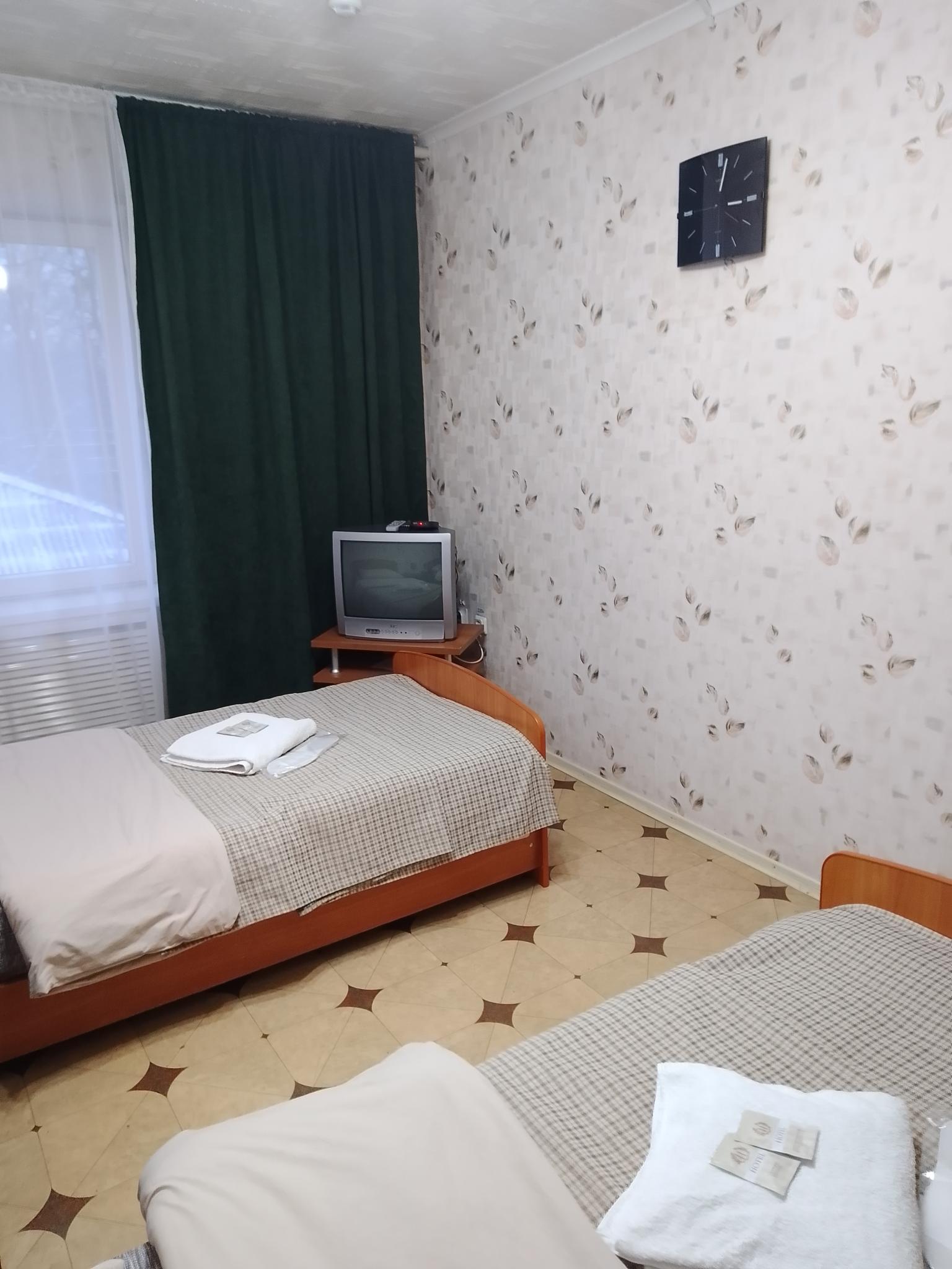Номер стандарт с 2 односпальными кроватями 2