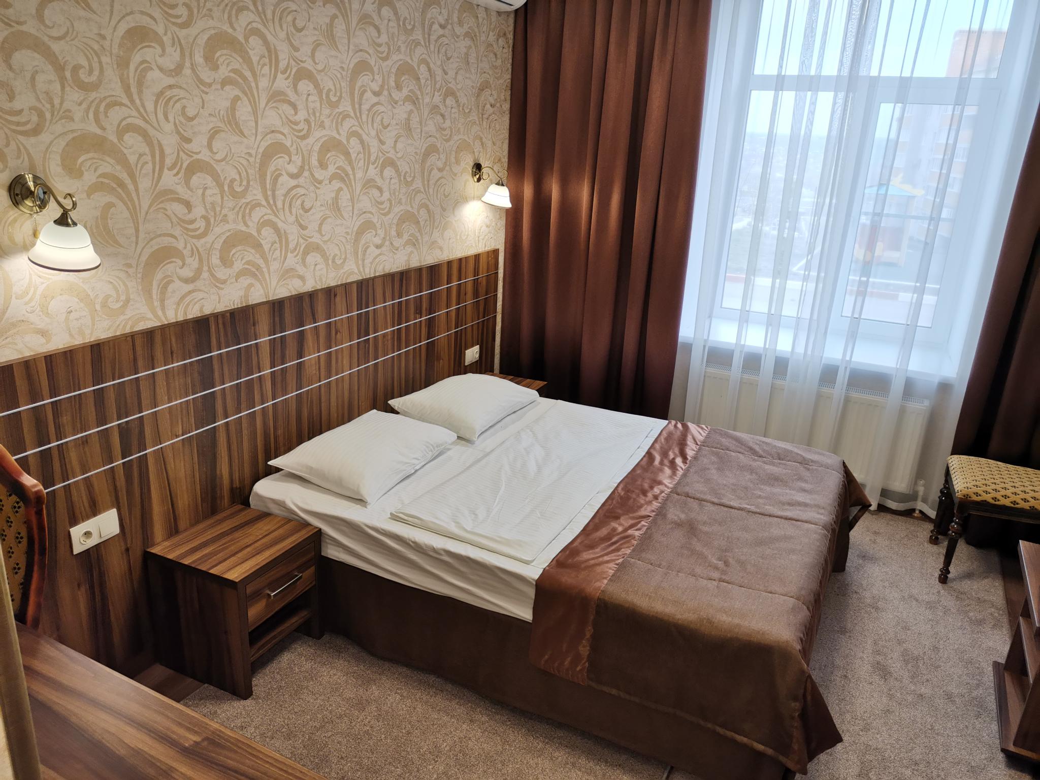 Номер стандарт с 1 двуспальной кроватью 3