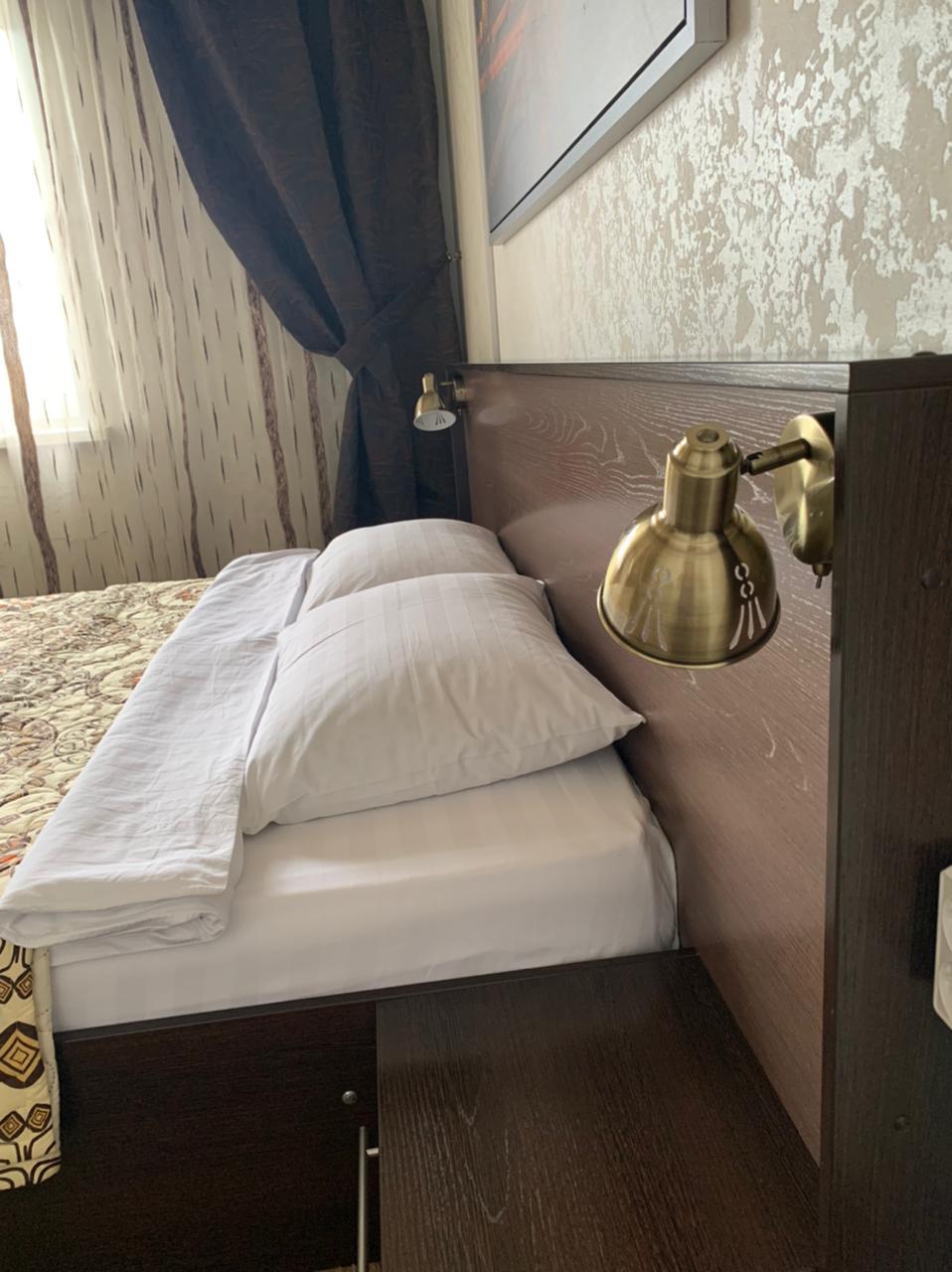 Номер стандарт с 1 двуспальной кроватью 4